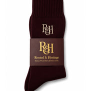 Brown sock with 'R&H' branding on a white background