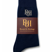 navy crew socks packaged in burgundy material