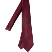 Maroon tie on a white background
