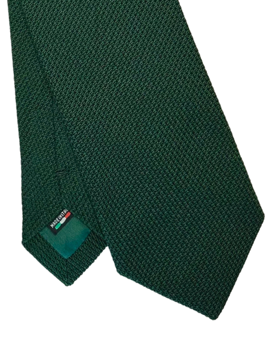 A dark green textured necktie with a small green brand tag showing the brand name 'Mazzucchelli'.