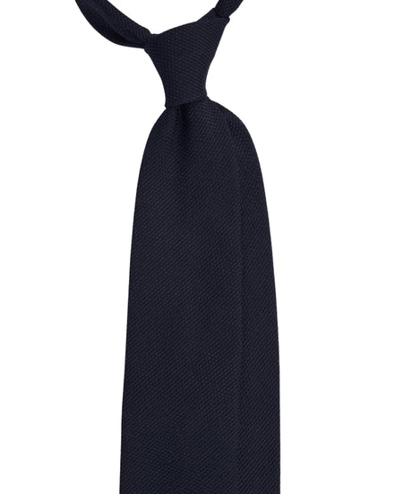 Navy blue tie on a white background